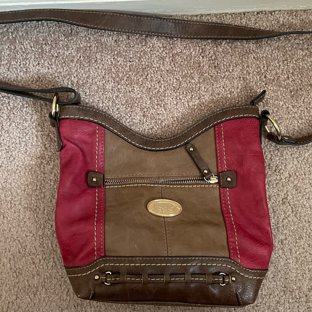 BOC Bag. Very pretty red and tan color. Used rarely.